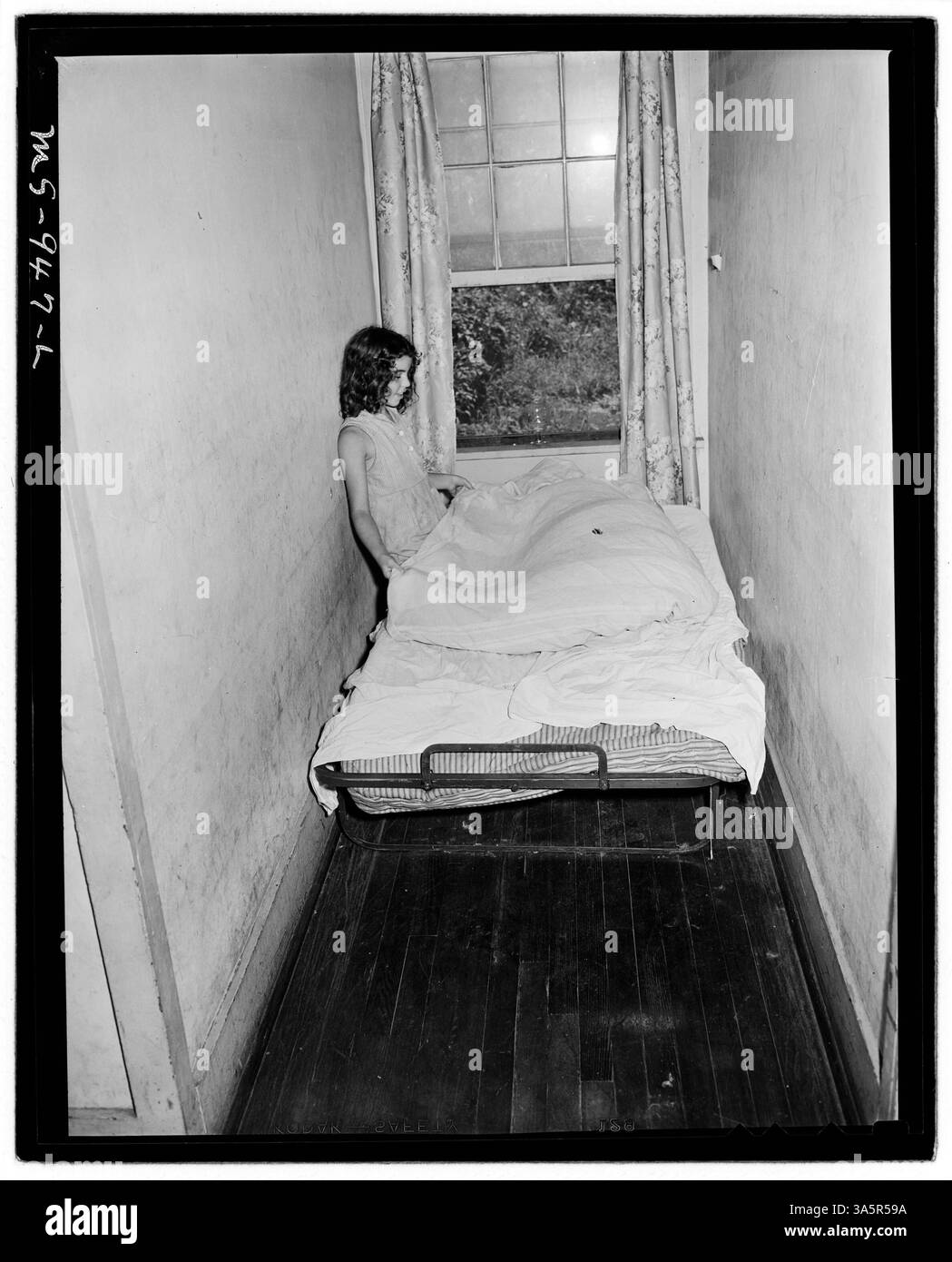 Une étroite alcôve dans la maison de A. J. Donaldson, un mineur de la Tennessee Coal, Iron & R.R. Company, reflète les conditions de vie modestes dans les logements de la société à Birmingham, en Alabama. Banque D'Images