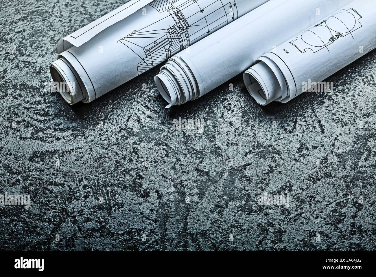 Trois plans roulés sur fond noir Banque D'Images