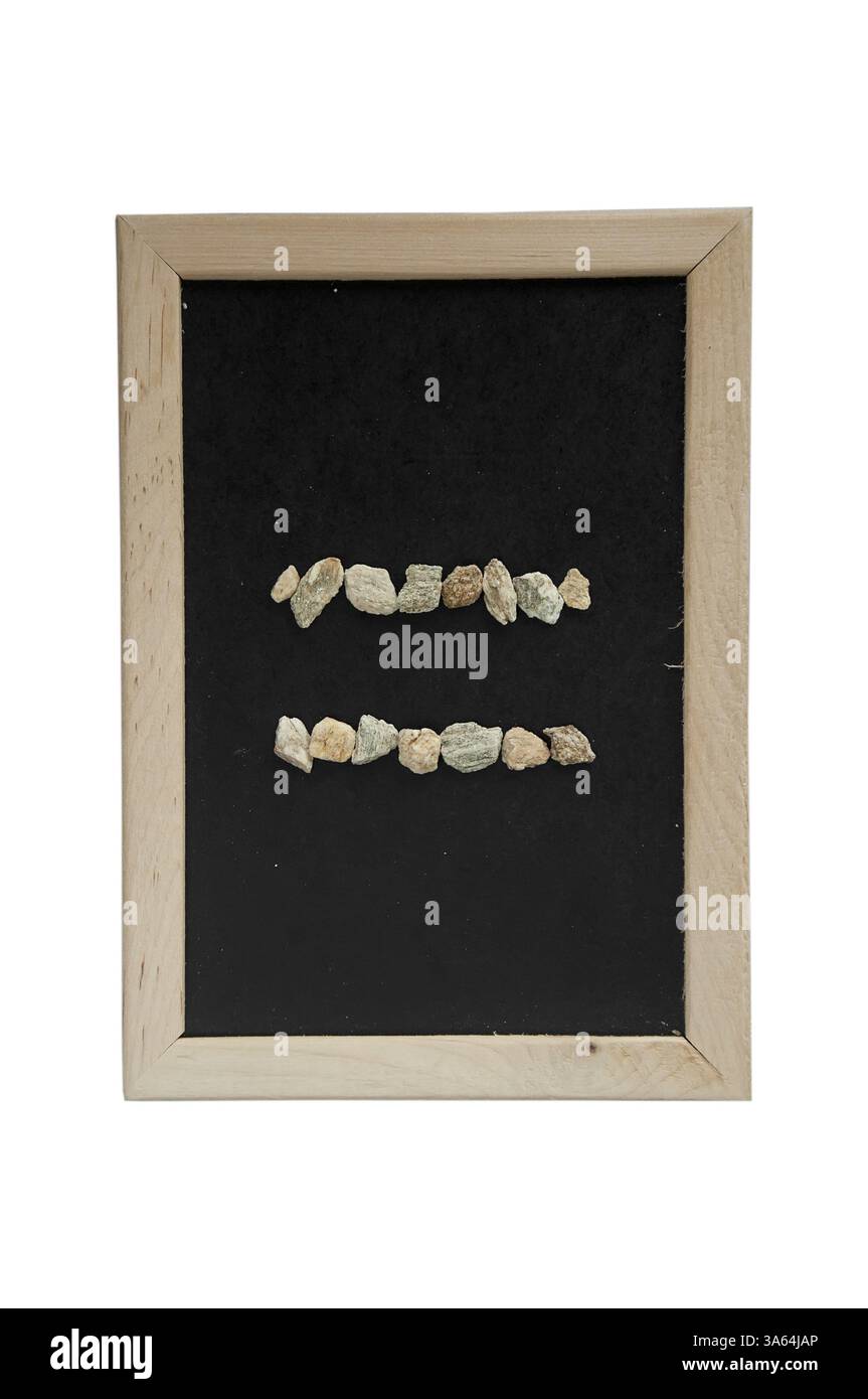 Pierre égale faite sur fond noir dans le cadre Banque D'Images