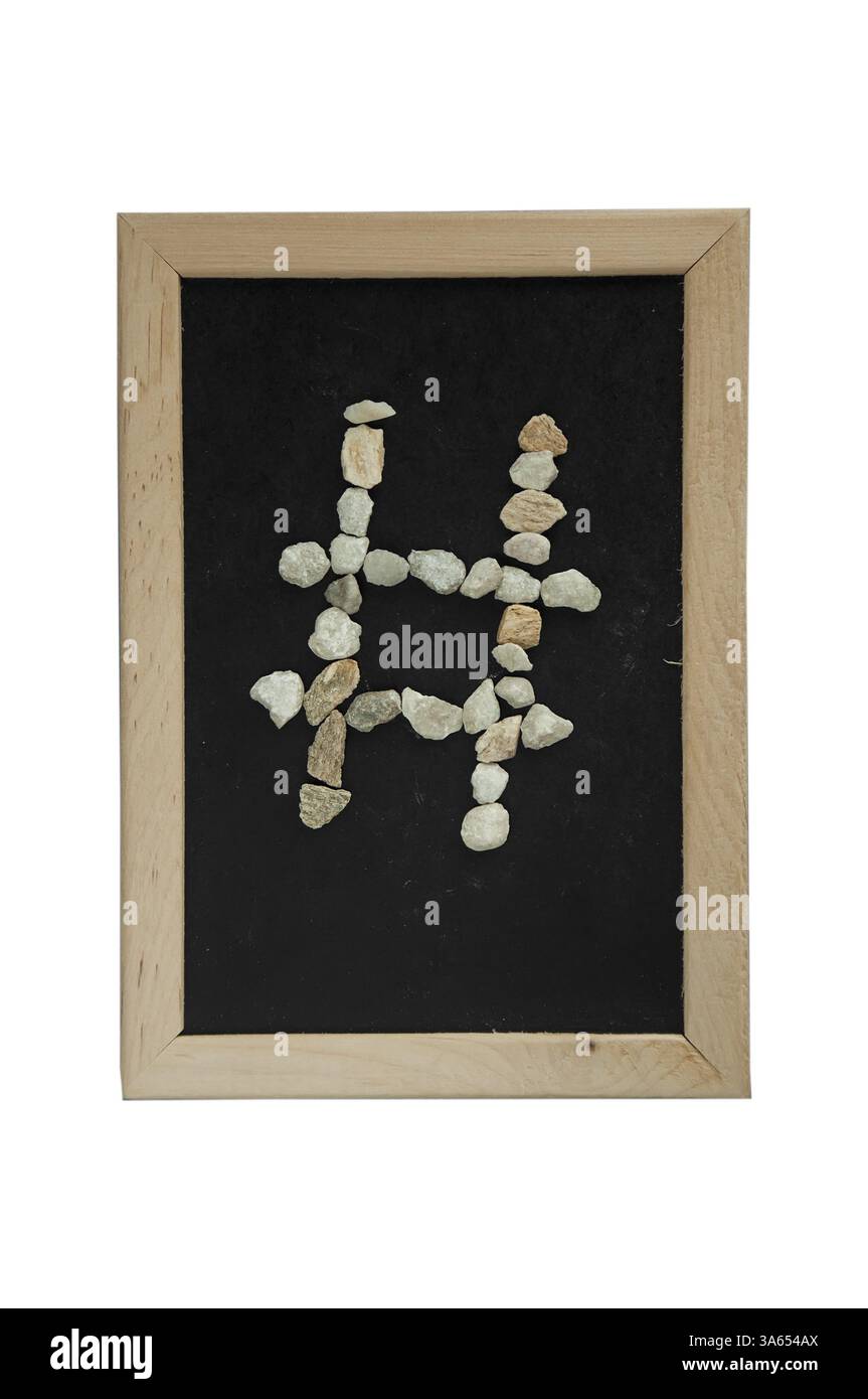 Pierre de symbole faite sur fond noir dans le cadre Banque D'Images