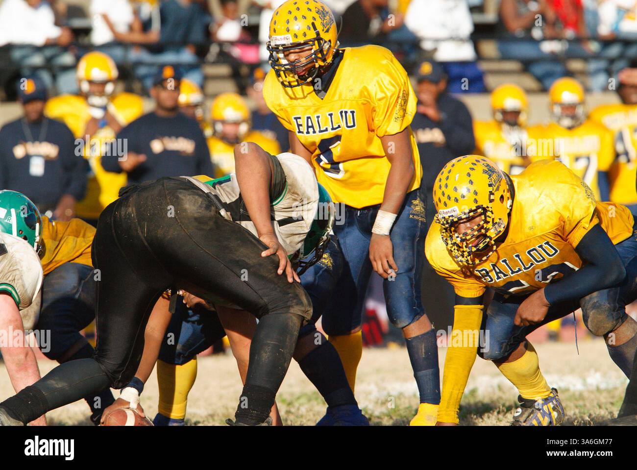 Action pendant un match de football entre les lycées Wilson et Ballou à Washington, DC. Usage éditorial uniquement. Banque D'Images