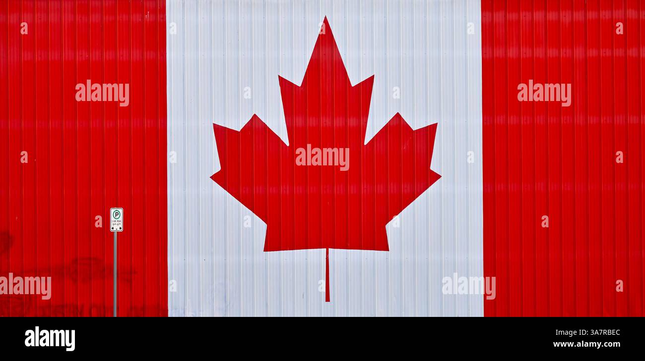 Drapeau canadien peint sur le bâtiment. Steveston, C.-B., Canada Banque D'Images
