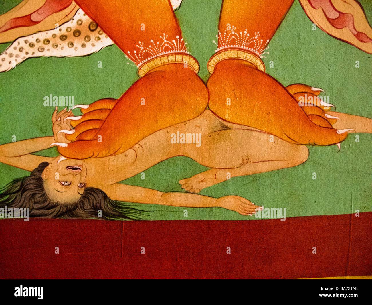 Le thangka tantrique à l'intérieur du monastère Jamchen Lhakhang montre une divinité courageuse piétinant un cadavre dans la destruction symbolique de l'ego et de l'ignorance. Banque D'Images