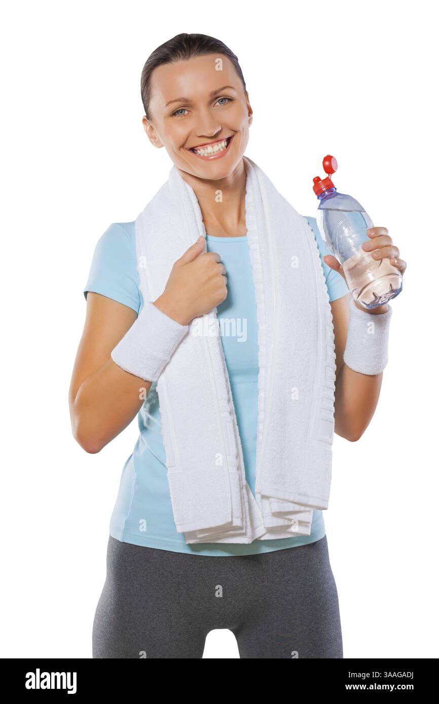 Une fille de fitness heureuse souriante isolée Banque D'Images