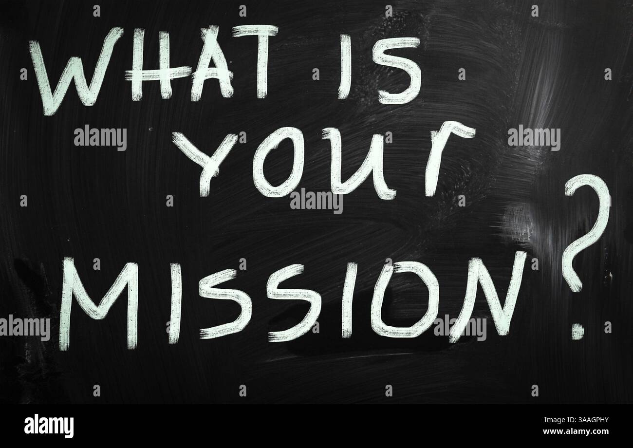 Quelle est votre mission écrite à la main avec de la craie blanche sur un tableau noir Banque D'Images