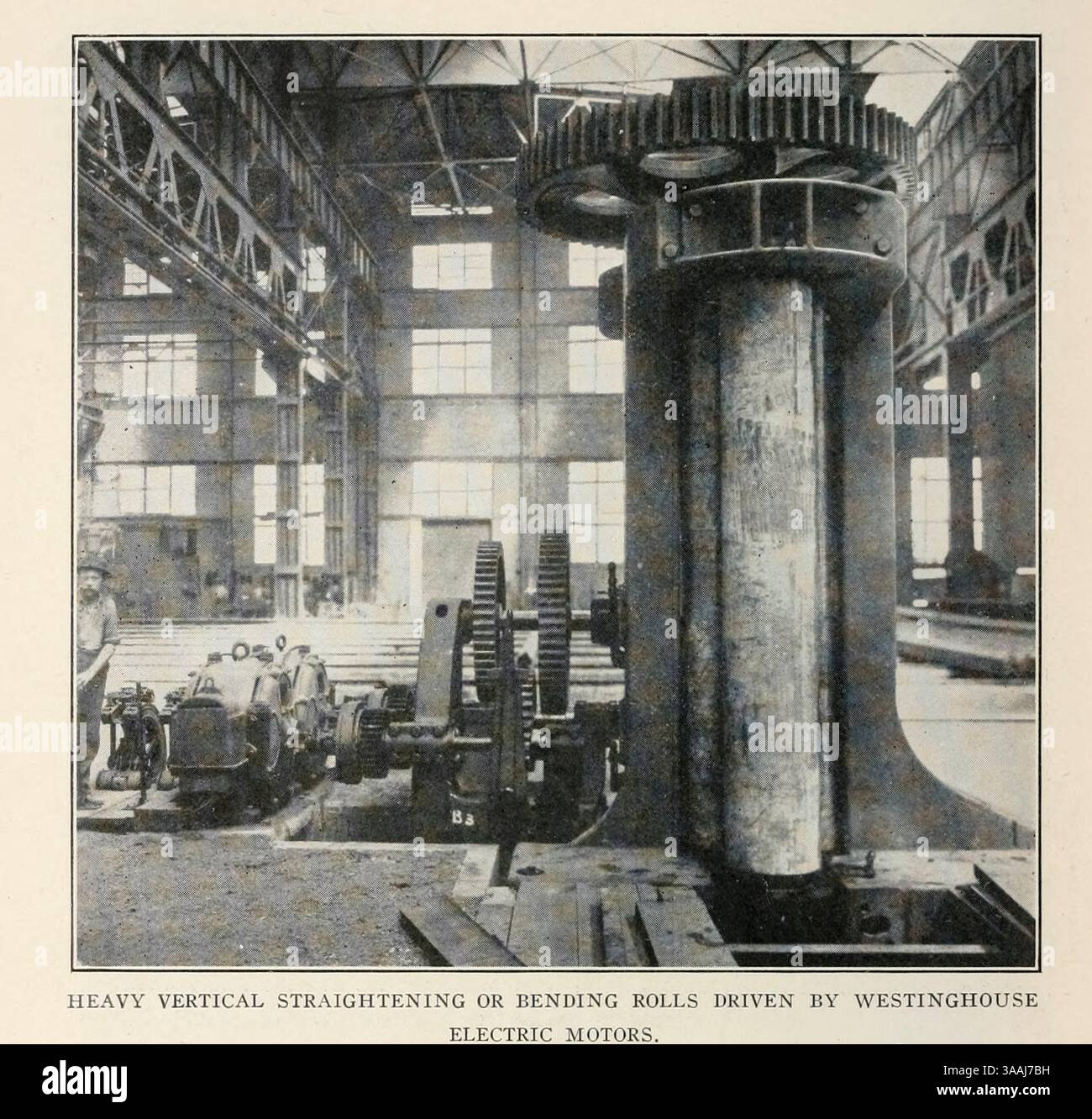 ROULEAUX VERTICAUX LOURDS DE DRESSAGE OU DE CINTRAGE ENTRAÎNÉS PAR DES MOTEURS ÉLECTRIQUES WESTINGHOUSE. New York Ship-Building Company, Camden, NJ de l'article ELECTRIC APPLIANCES IN SHIP-BUILDING YARDS. Par Sydney F. Walker. Tiré de l'Engineering Magazine consacré au progrès industriel volume XXII 1901-1902 The Engineering Magazine Co Banque D'Images