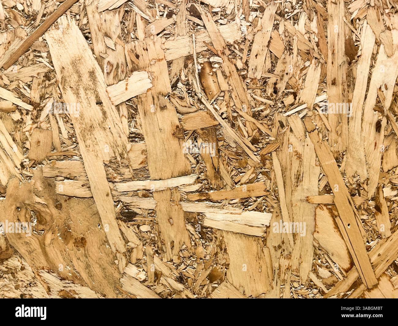 vue rapprochée de la texture du contreplaqué de panneaux de particules comme arrière-plan - Image de stock capturée avec un smartphone