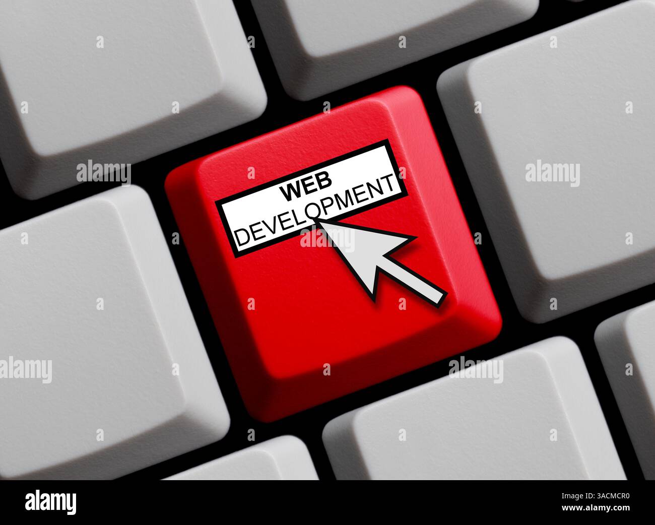 Le bouton rouge du clavier affiche le développement Web avec la flèche de la souris Banque D'Images