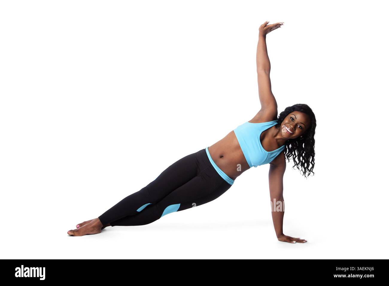 Belle femme faisant plancher pilates yoga entraînement exercice de fitness pour la santé, concept de soins du corps, t-stand pose, Atlanta, USA, Amérique du Nord Banque D'Images