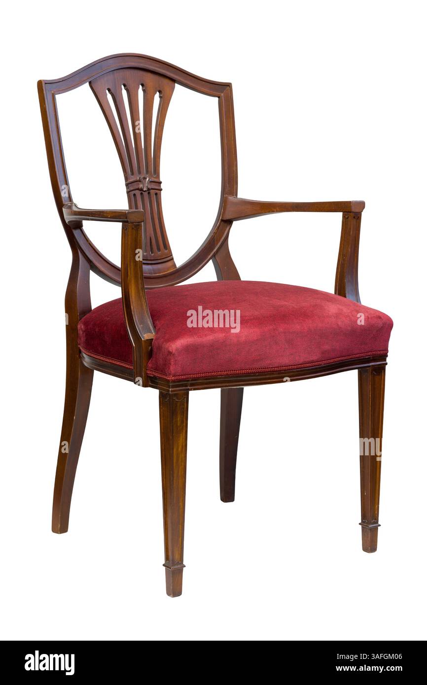 Fabriqué à partir de bois de haute qualité, ce fauteuil dispose d'un design élégant avec un siège rembourré rouge, adapté pour les salles à manger ou comme pièce d'accent i. Banque D'Images