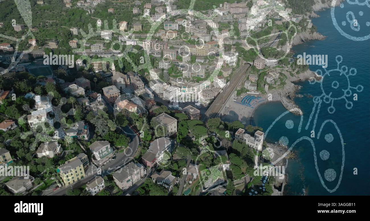 Image des icônes COVID 19 coulant au-dessus de la vue aérienne du paysage urbain Banque D'Images