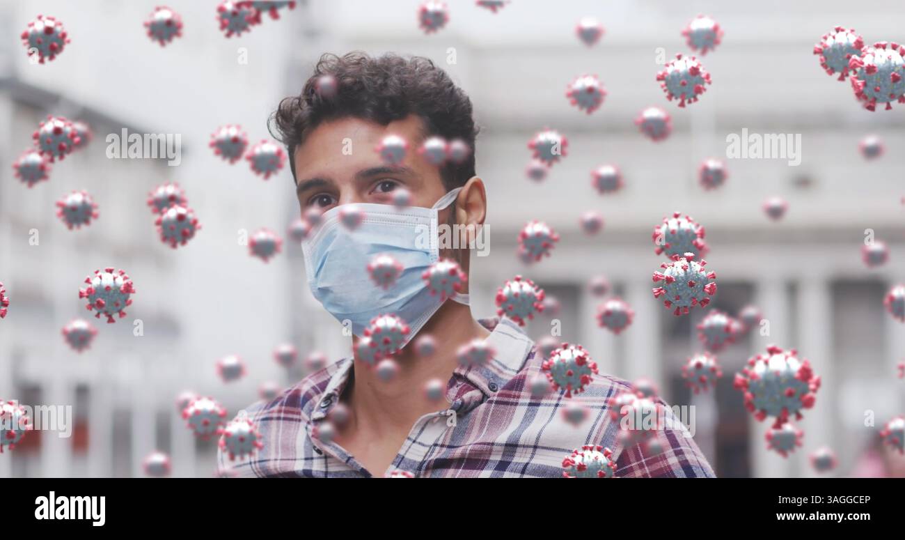 Image de cellules covid 19 au-dessus d'un homme caucasien portant un masque facial Banque D'Images