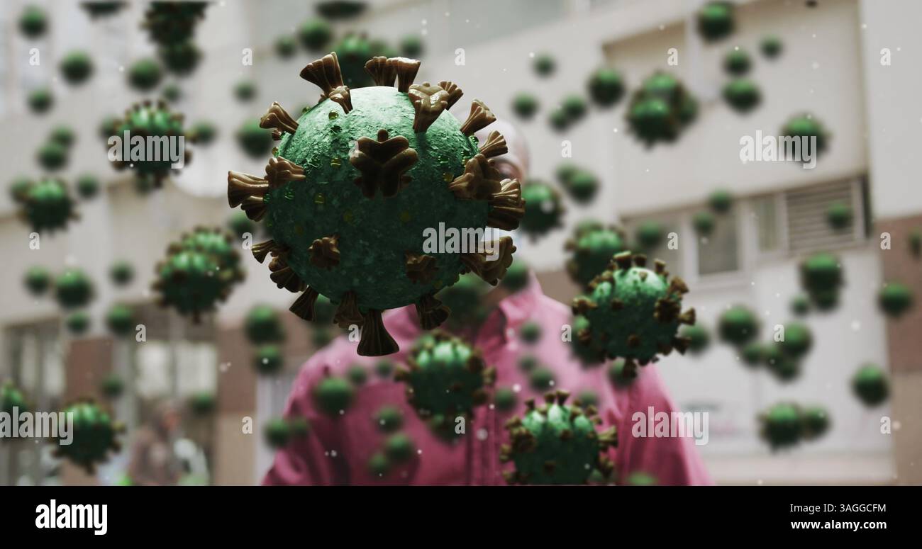 Image de cellules macro covid 19 au-dessus d'un homme portant un masque facial Banque D'Images