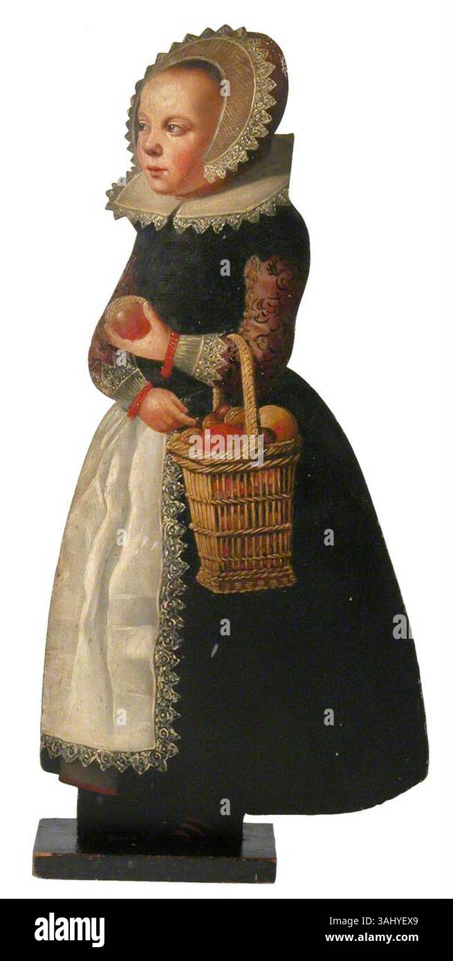 Cette peinture hollandaise du XVIIe siècle représente une fille debout tenant un panier de pommes, conçu comme une planche factice. Peinte entre 1650 et 1699, la pièce capture une charmante représentation d'une jeune fille avec un cadre et un style typiquement néerlandais du XVIIe siècle. Banque D'Images