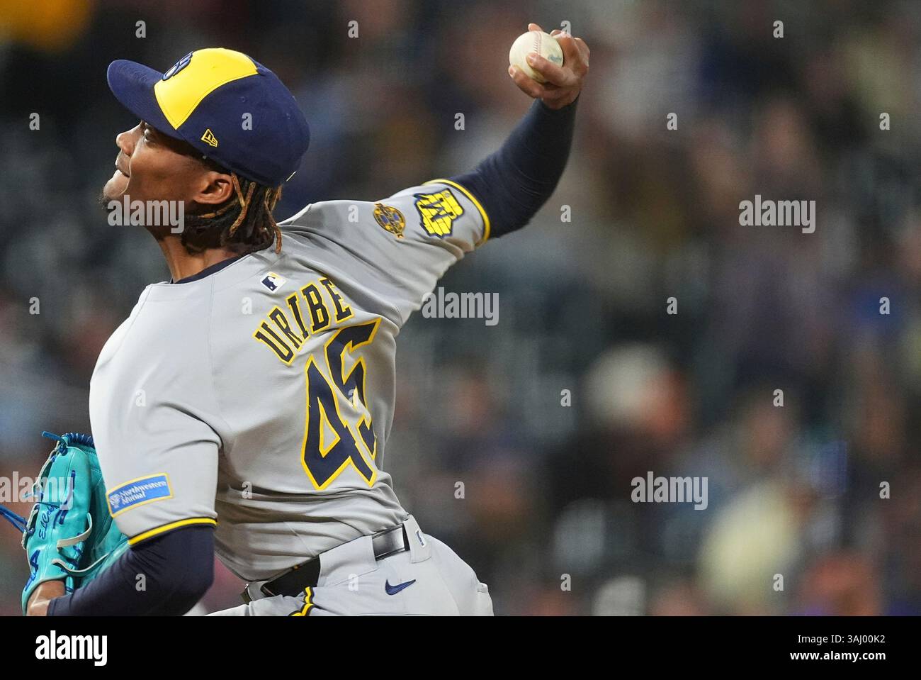 Milwaukee Brewers pitcher Abner Uribe (45) in the sixth inning of a baseball game Tuesday, April 8, 2025, in Denver. (AP Photo/David Zalubowski) Banque D'Images