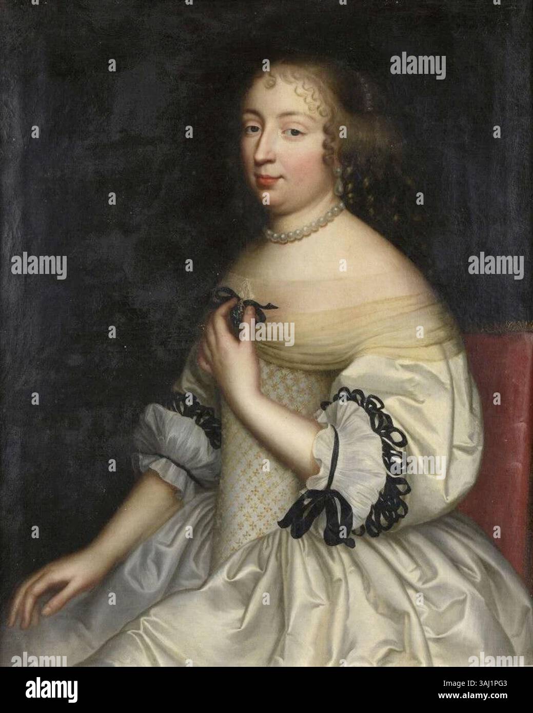Ce portrait du XVIIe siècle attribué à Jean Nocret représente une dame non identifiée dans une robe de cour élaborée, reflétant la noble tenue et la mode de l'époque. Banque D'Images