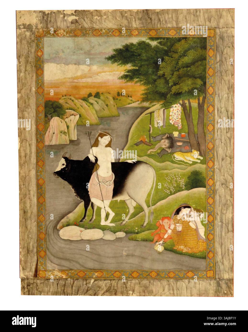 Cette aquarelle opaque d'environ 1800 et d'or sur papier représente Shiva avec sa famille, une figure centrale de l'hindouisme. L’œuvre est créée par l’atelier familial Seu-Nainsukh, captant les liens divins et familiaux. Banque D'Images
