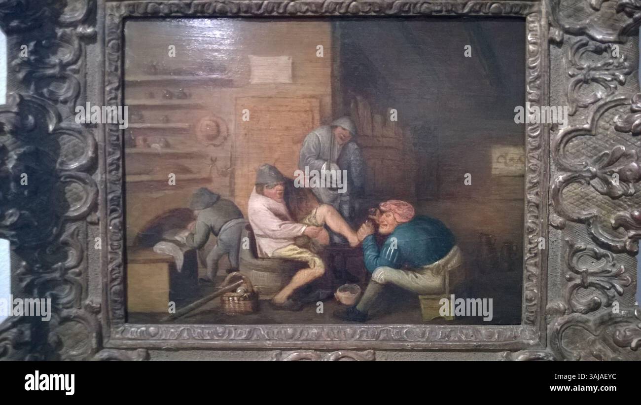 Anthonie Victorijns peint les années 1650 'chirurgie du pied', dépeignant une procédure médicale de l'époque. L'huile sur panneau est conservée au Musée Gouda et fait partie de la collection d'art de genre, capturant la pratique de la chirurgie au XVIIe siècle. Banque D'Images