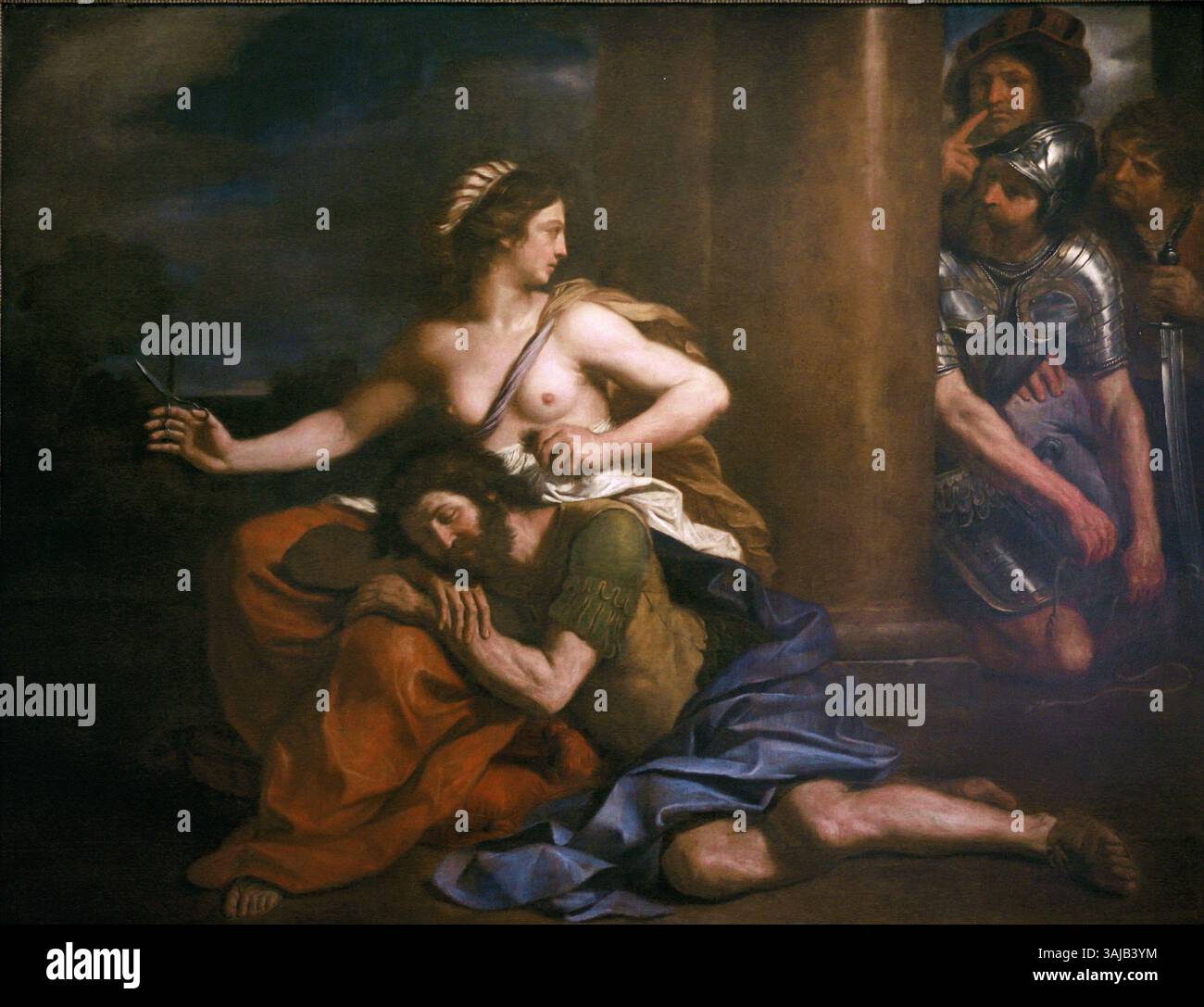 Une peinture à l'huile de Guercino de 1654 représentant l'histoire biblique de Samson et Delilah, mettant en valeur la lumière et l'ombre dramatiques typiques du baroque complet Banque D'Images