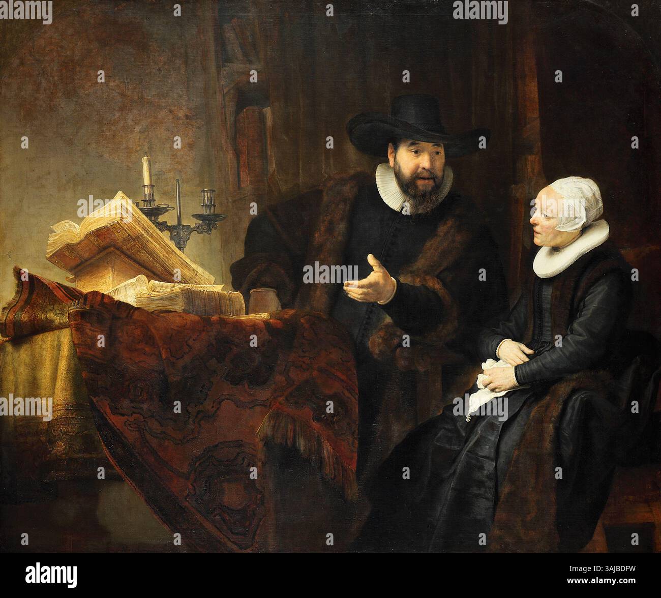 Ce portrait, réalisé en 1641 par Rembrandt, montre Cornelis Claesz Anslo, un prédicateur mennonite éminent, et son épouse, Aeltje Gerritsdr Schouten. Le tableau, conservé au Gemäldegalerie Berlin, met en évidence la capacité de Rembrandt à capturer la dignité et le sérieux des sujets. Banque D'Images