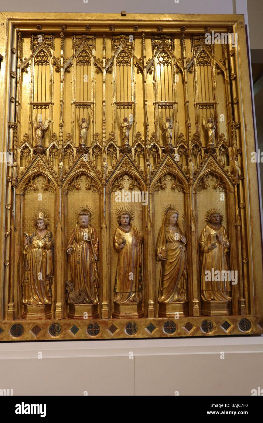 Une section du retable des saints et martyrs abrité au Musée des Beaux-Arts de Dijon, illustrant le traitement délicat des sujets religieux dans le baroque français Banque D'Images