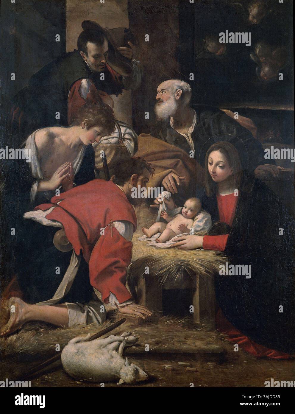 Le tableau de Giacomo Cavedone de 1628, « L'Adoration des bergers », montre la scène de la Nativité avec les bergers présentant des dons à l'enfant Christ. La pièce reflète l'art religieux baroque avec une forte émotion et un éclairage dramatique. Banque D'Images