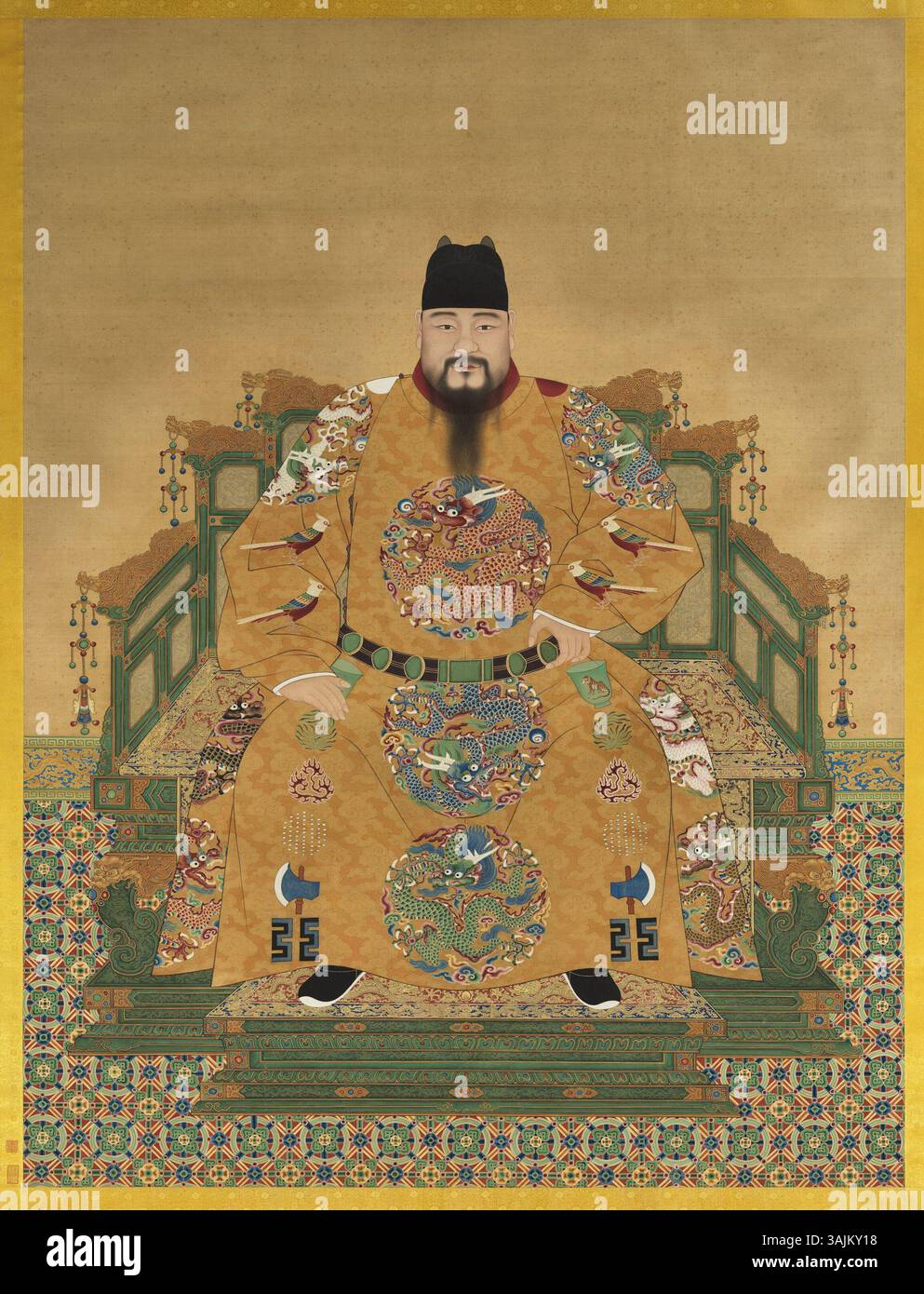 Portrait assis de l'empereur Xianzong de la dynastie Ming, peint dans le style impérial traditionnel. L'empereur est représenté dans des robes de cérémonie, soulignant son autorité en tant que souverain de la dynastie Ming. Banque D'Images
