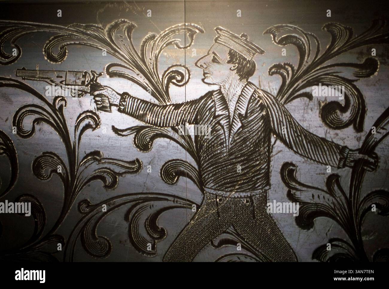 La gravure dans un Colt, présentation Model Navy Revolver, 1866...pistolets : Dazzling Firearms (27 septembre 2008 - 3 janvier 2009 )..les armes décorées et les armures ont toujours fait partie de l'Occident. En fait, décorer oneÃs arme est une tradition très ancienne partagée par de nombreuses cultures différentes dans le monde entier. Découvrez plus de 50 armes à feu américaines décoratives et historiquement importantes. De Annie Oakley à JFK en passant par Gene AutryÃs Dragoon, spécialement conçu par Tiffany, vraiment ce dont les légendes sont faites. Organisé par le Museum of the American West, Autry National Center, Los Angeles, Californie. Dans le Banque D'Images