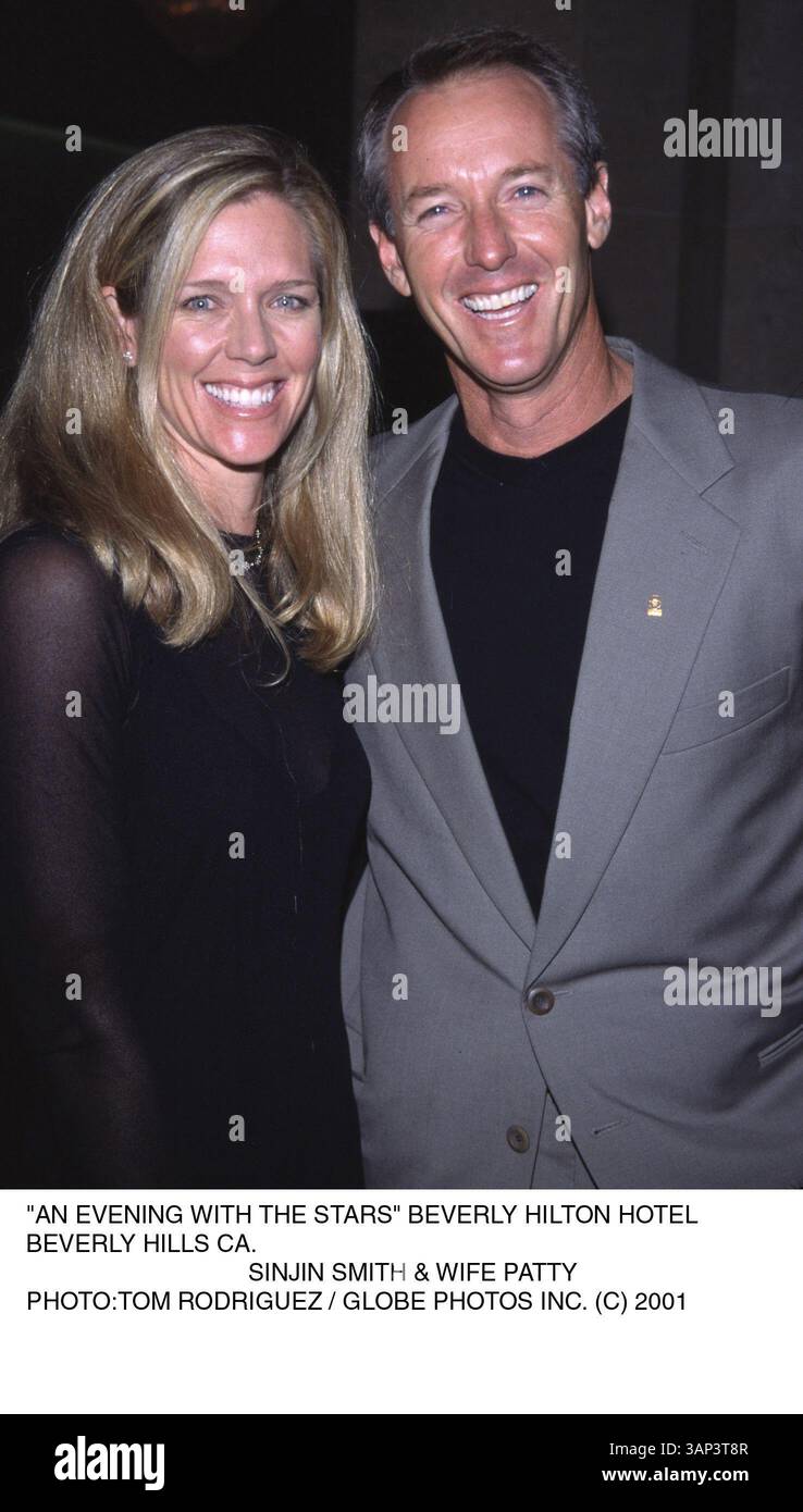 1 JANVIER 2011 - ''UNE SOIRÉE AVEC LES ÉTOILES'' HÔTEL BEVERLY HILTON . BEVERLY HILLS CA.. SINJIN SMITH ET SA FEMME PATTY . TOM RODRIGUEZ / K23445TR (C) 2001 SD1117(crédit image : © Globe photos/ZUMAPRESS.com) Banque D'Images
