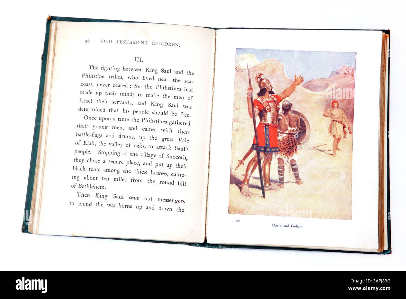 Livre pour enfants antique ouvert montrant l'illustration de David et Goliath (Samuel) de Antique 1909 Religious Children's Book of the Old Testam Banque D'Images