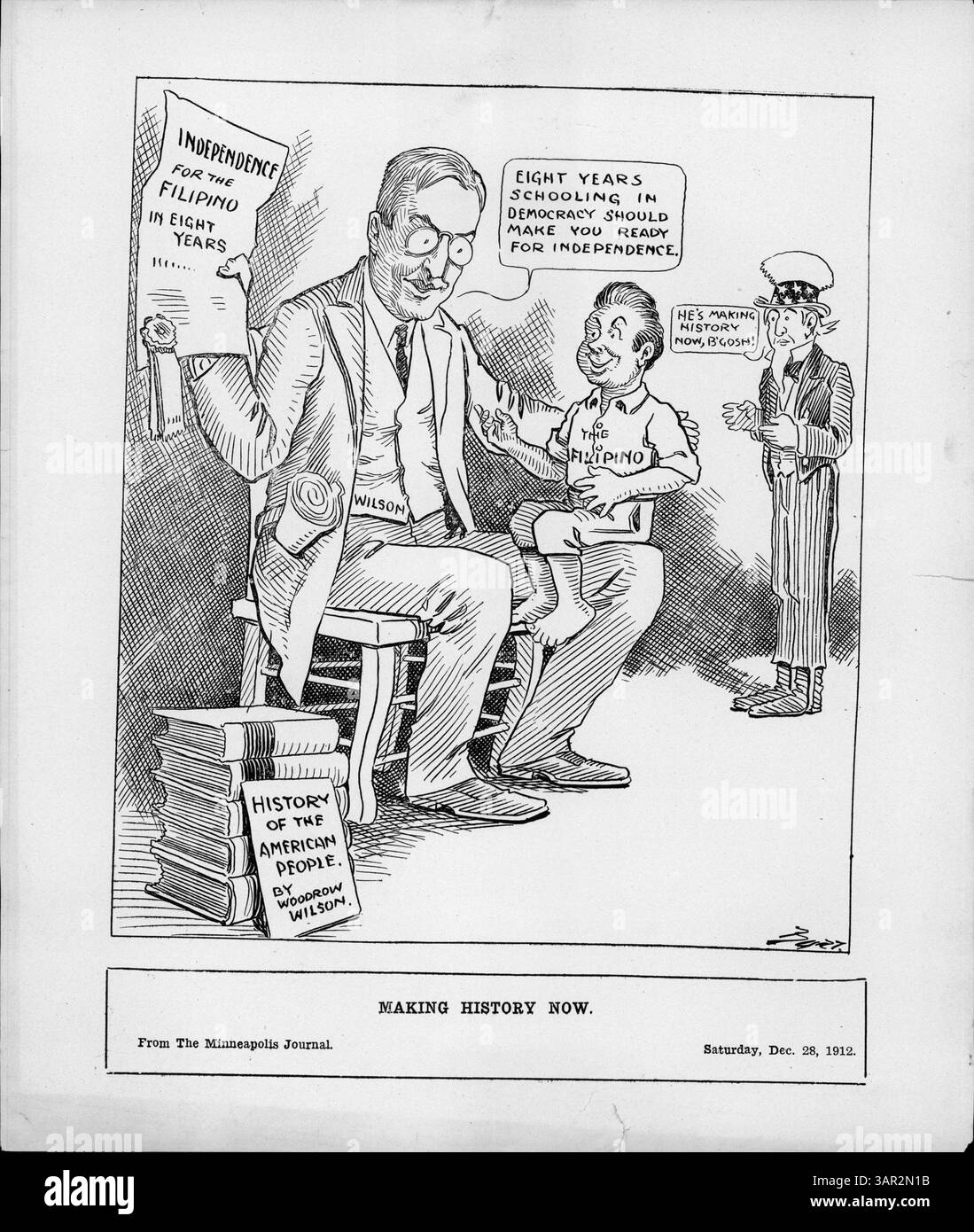L'image montre Woodrow Wilson avec un enfant philippin, plaidant pour l'indépendance des Philippines. Wilson est représenté tenant un document soutenant le Jones Bill, qui visait à accorder l'indépendance aux Philippines après huit ans d'éducation démocratique. Banque D'Images