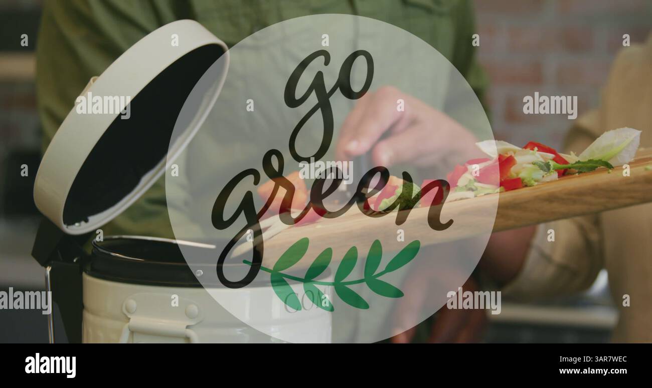 Image d'un texte vert sur une femme biraciale jetant des ordures organiques dans la poubelle Banque D'Images