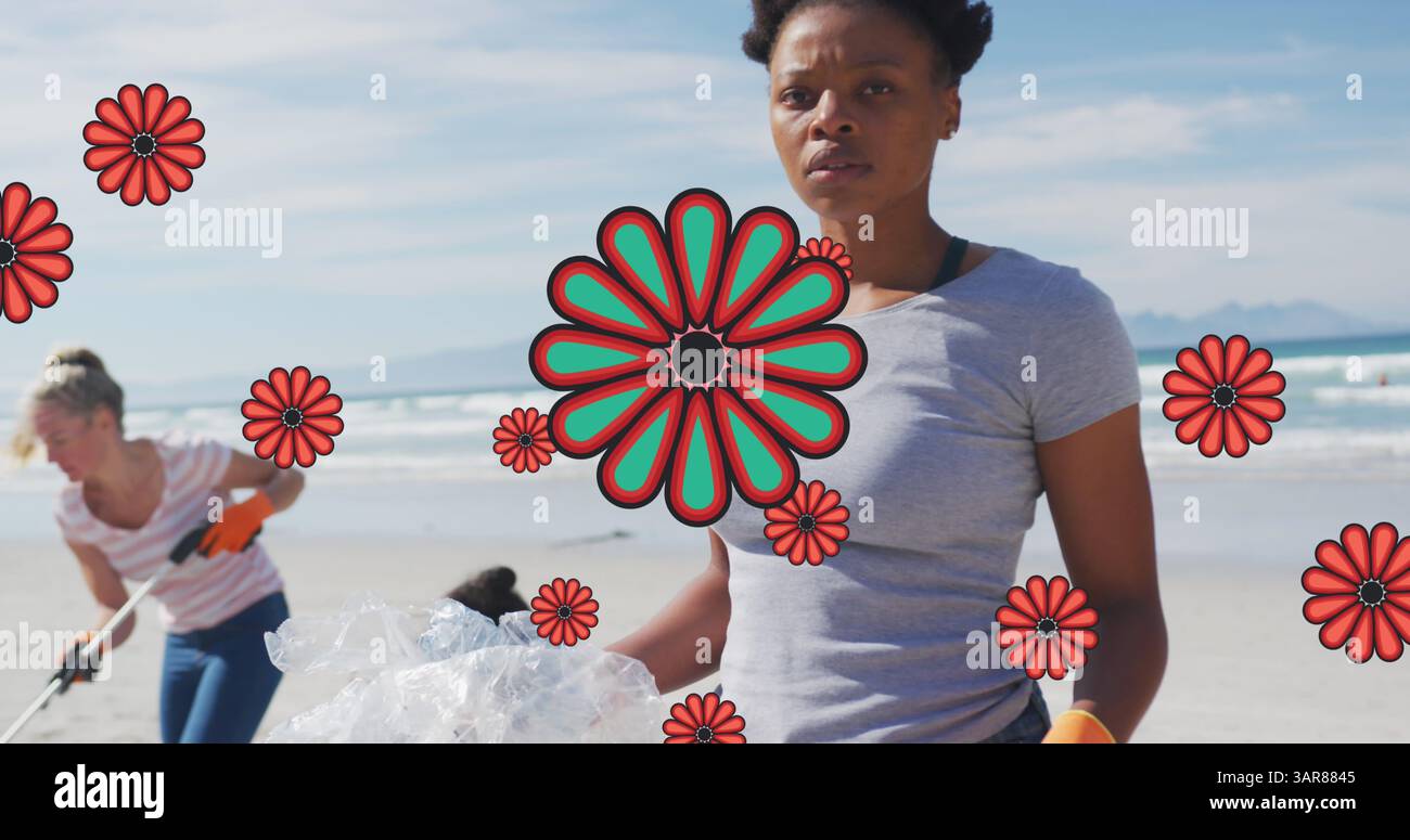 Image de fleurs sur une volontaire afro-américaine ramassant des ordures sur la plage Banque D'Images