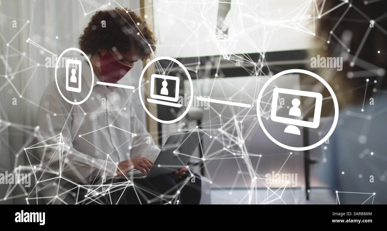 Image d'icônes de médias sur homme d'affaires biracial avec masque facial Banque D'Images