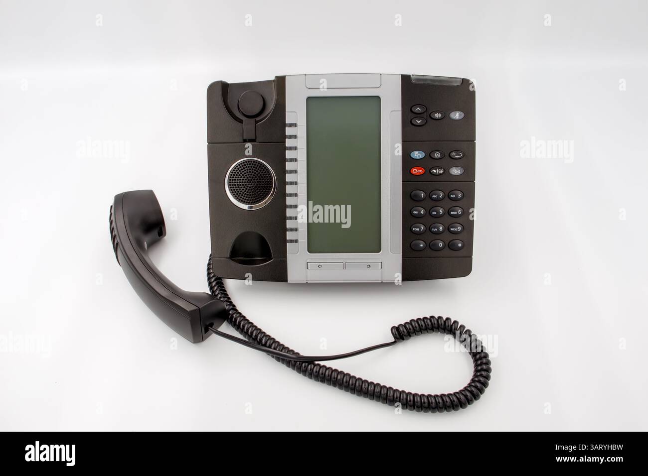 Combiné téléphonique professionnel avec fond blanc. Banque D'Images