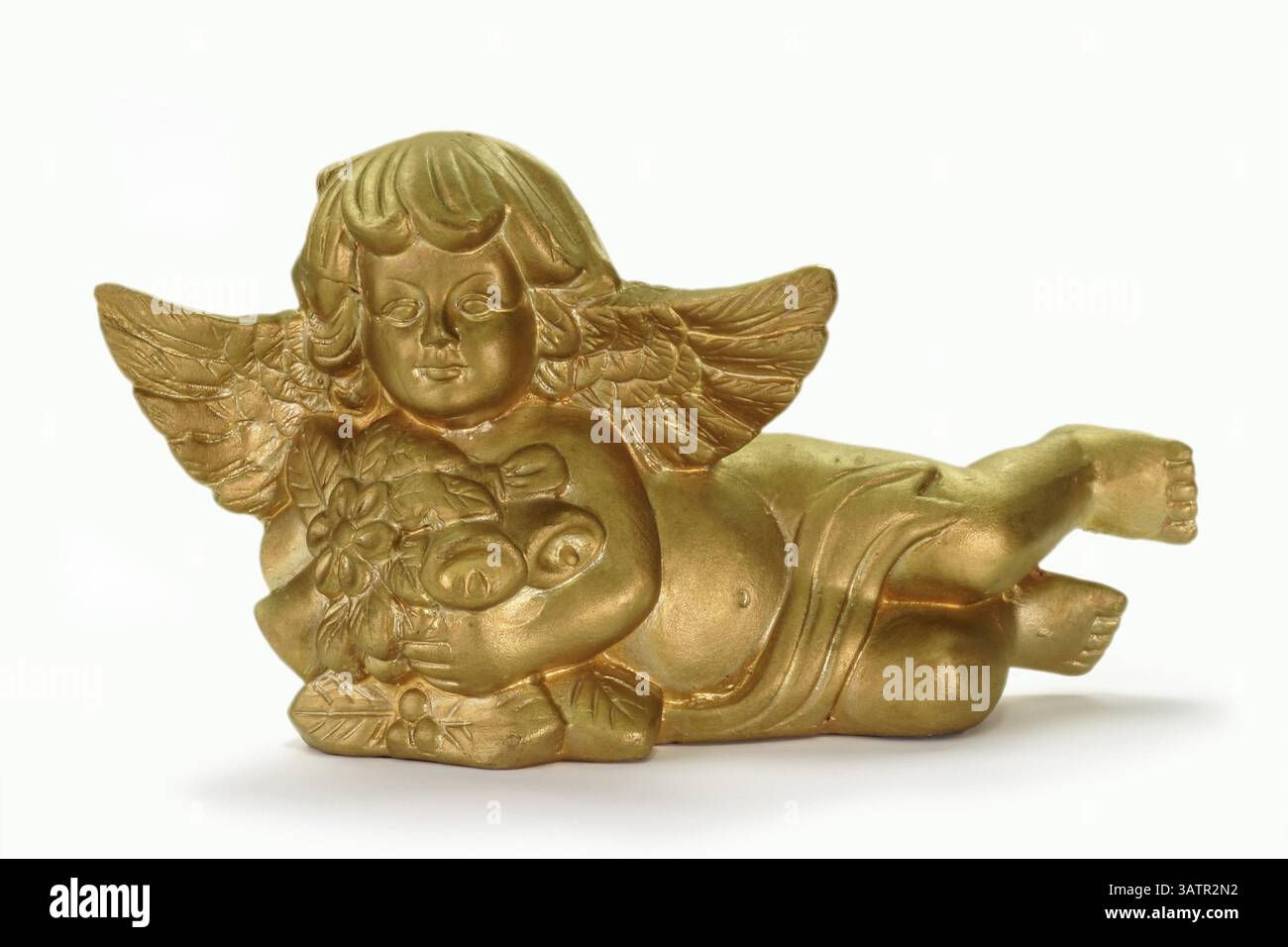 Ange doré sur fond lumineux Ange doré décoratif sur fond lumineux Banque D'Images