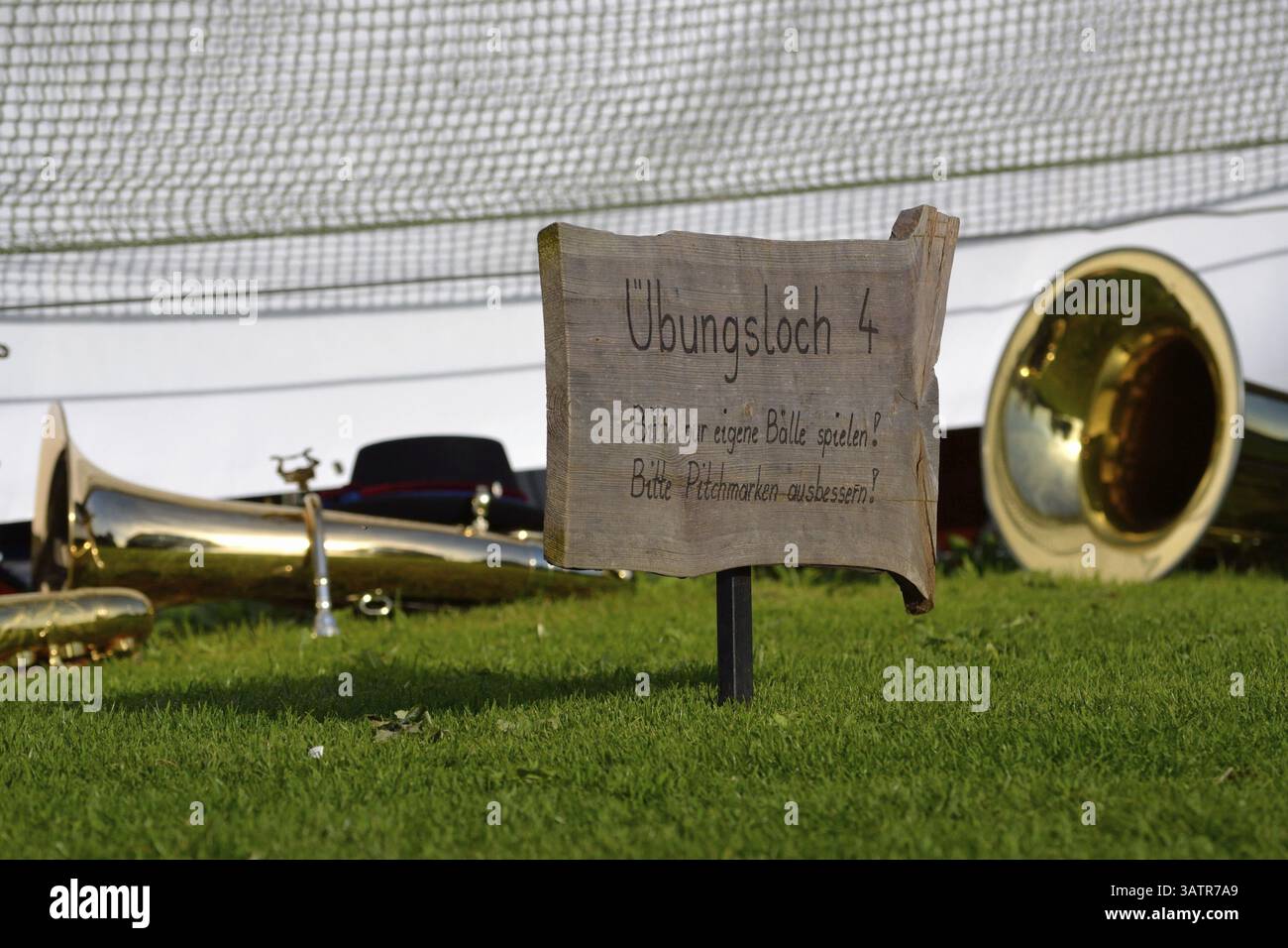 Instruments de musique et instruction sur le terrain de golf Banque D'Images