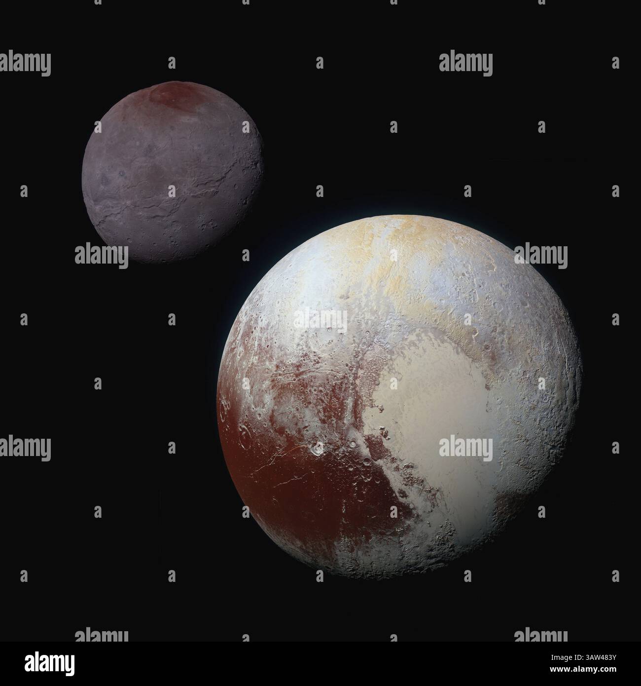 21 septembre 2015 - espace - Un composite d'images en couleurs améliorées montrant Pluton en bas à droite et Charon, la plus grande lune autour de la naine vue depuis le vaisseau spatial New Horizons sorti le 2 octobre 2015 du survol de la sonde en juillet. (Crédit image : © NASA/NASA/ZUMAPRESS.com) Banque D'Images