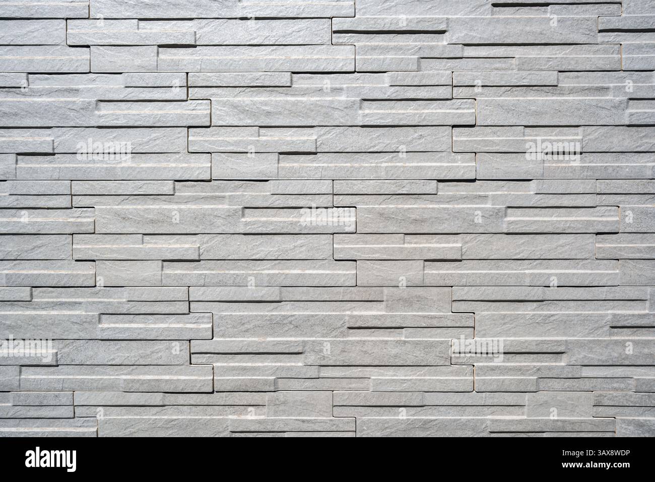 Fond d'un mur en carreaux de pierre blanche Banque D'Images