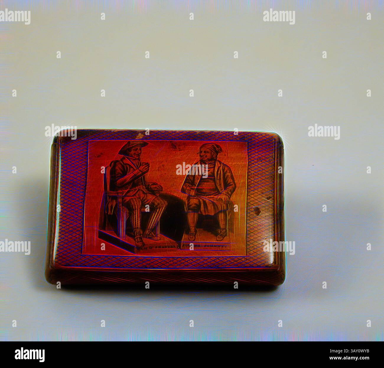 Une boîte rectangulaire ornée avec une illustration détaillée de deux personnages assis engagés dans la conversation, entourés de motifs décoratifs. L'artisanat suggère une signification culturelle ou historique, ajoutant un sens de la narration à la pièce., peut-être inconnu (irlandais), snuffbox, c. 1825, Paper mache, 3 1/8 x 2 1/8 x 3/4 po (7,9 x 5,4 x 1,9 cm), art classique avec une touche moderne réinventée par Artotop Banque D'Images