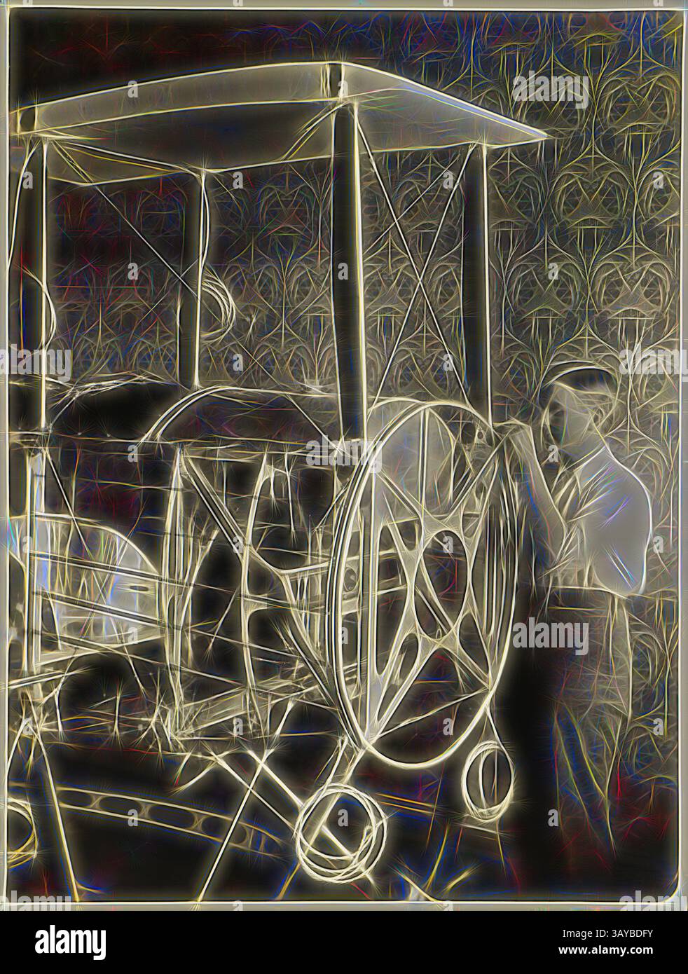 Un avion d'époque est présenté, mettant l'accent sur sa conception complexe et ses caractéristiques d'ingénierie, tandis qu'une figure examine attentivement les commandes, capturant un moment d'enthousiasme et d'exploration de l'aviation précoce., photographie - Basil Watson montage du cadre de montage du moteur sur son biplan partiellement construit dans la maison familiale, Elsternwick, Victoria, 1916, partie d'un album photographique commémoratif produit par Sears' Studios, Melbourne, documentant le travail de Basil Watson dans la construction d'un biplan à sa maison familiale 'Foilacleugh' à Elsternwick, en 1916, Victoria, Victoria, et les suites de son fatal Banque D'Images