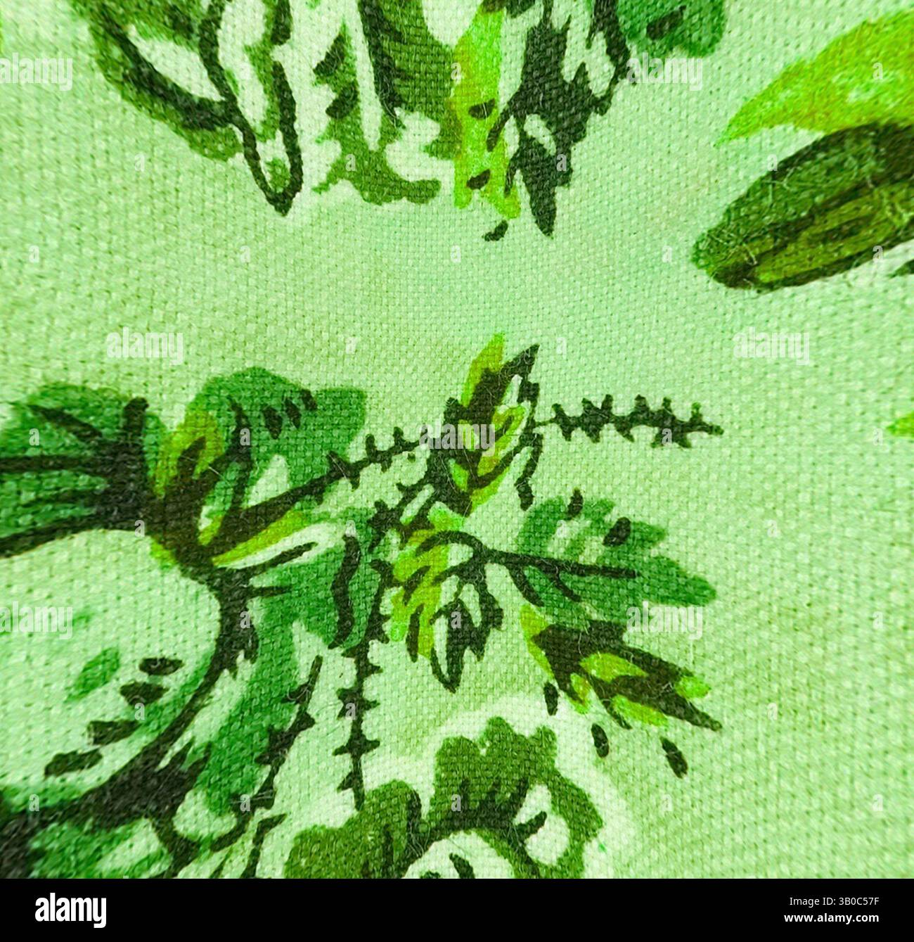 Une vue rapprochée présentant un motif de tissu vert éclatant orné de feuilles complexes et de motifs floraux, mettant en évidence un thème botanique luxuriant., Un tissu vert éclatant orné de motifs floraux complexes, avec des grappes de feuilles et de fleurs entrecoupées de détails fins en pointillés. Art classique avec une touche moderne réinventé par Artotop, tissus français transformés, première moitié du XIXe siècle, art classique avec une touche moderne réinventé par Artotop Banque D'Images