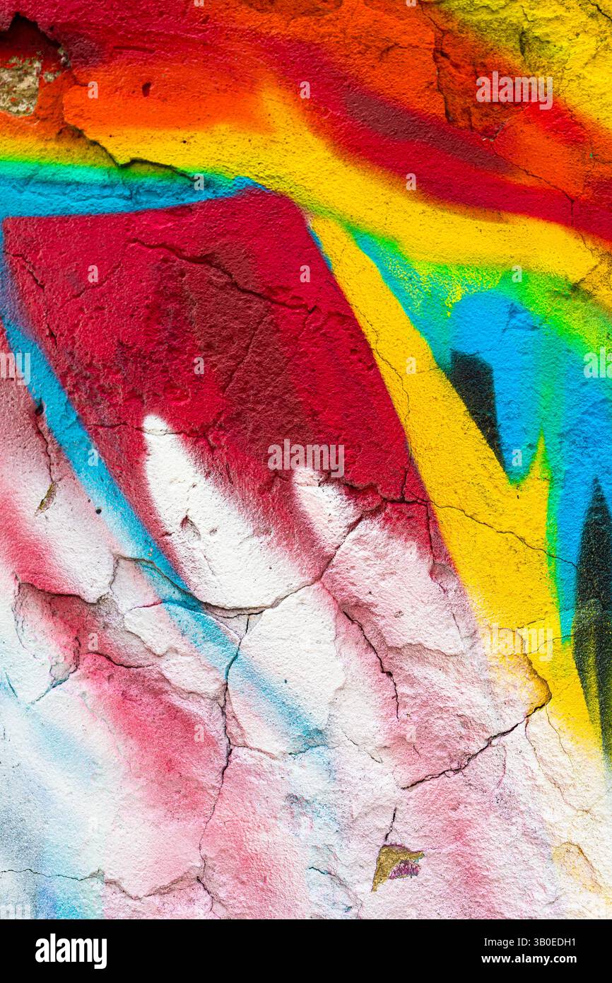 Texture graffiti vibrante avec rouge fluo et bleu, Street Art Vibe des années 80 Banque D'Images