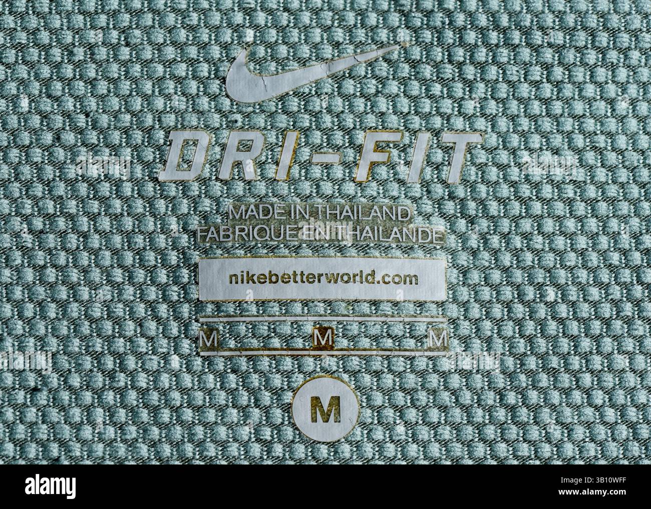 Étiquette Nike Made in Thailand sur le vêtement Nike dri-FIT Banque D'Images
