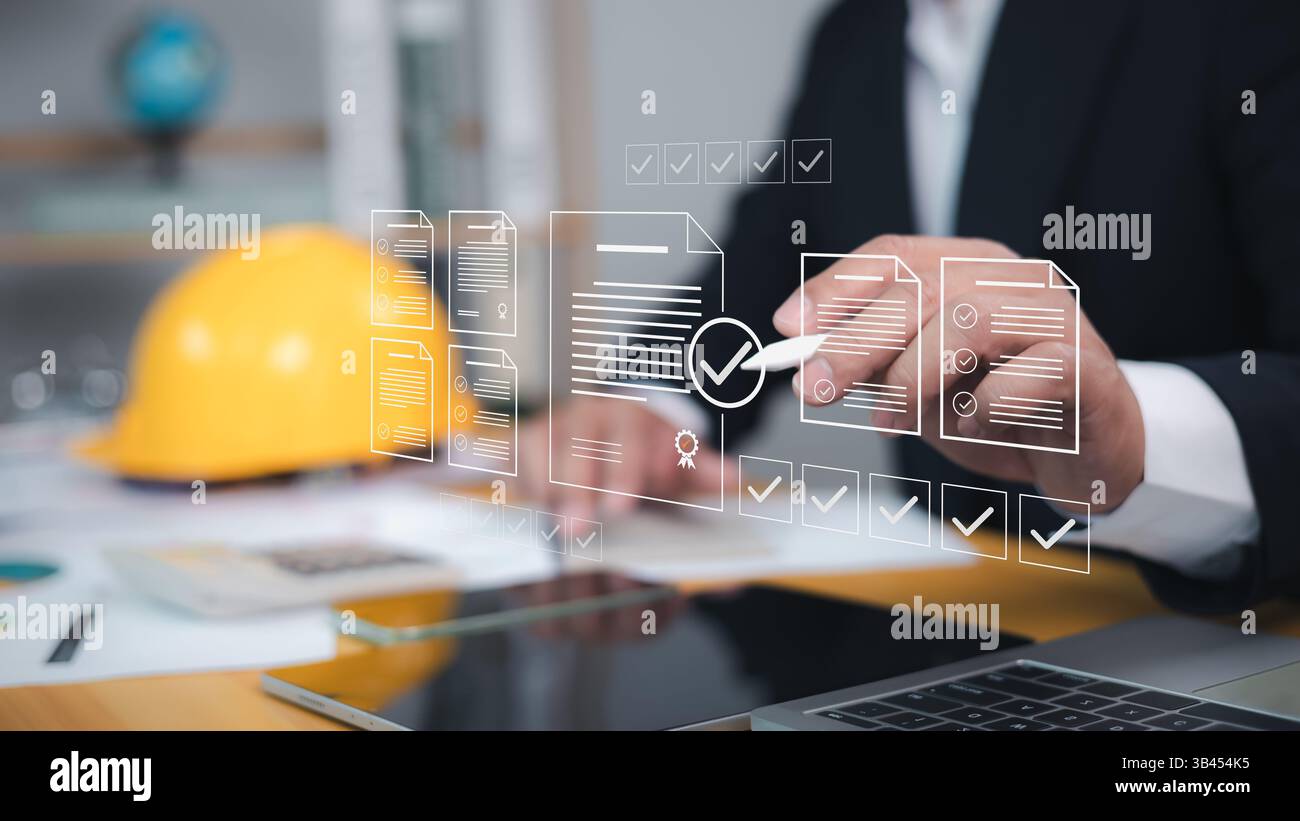 Concept de permis de construction approuvé avec projet de construction résidentielle approuvé, inspection de projet de construction, architecte ou ingénieur vérifiant la liste Banque D'Images