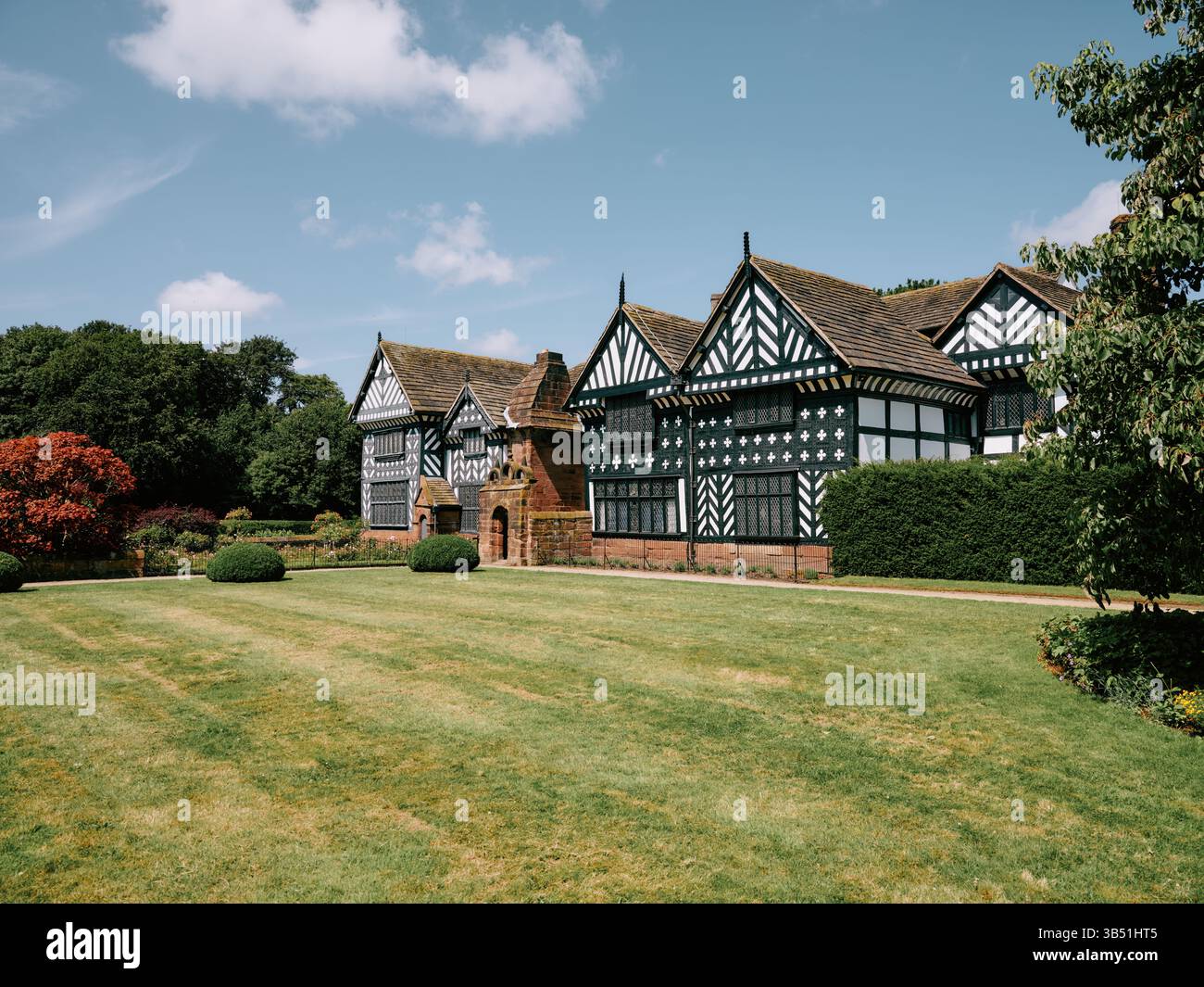 Speke Hall iwood-encadré Wattle-and-daub manoir Tudor et jardins à Speke, Liverpool, Angleterre. ROYAUME-UNI Banque D'Images