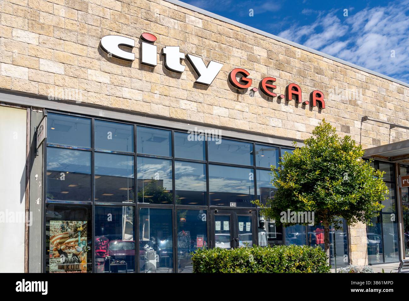 Gros plan de l'enseigne City Gear sur le bâtiment. Banque D'Images
