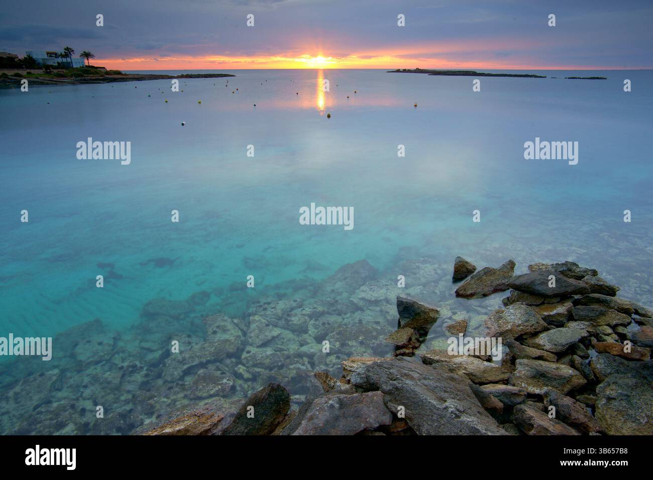 Coucher de soleil à Embarcadero es Cotó, Colonia de Sant Jordi, Salines, Majorque, Îles Baléares, Espagne Banque D'Images