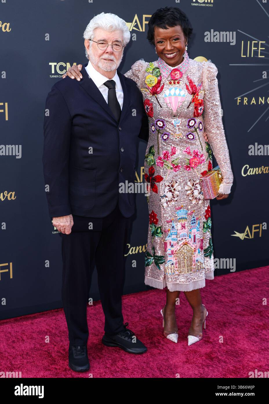HOLLYWOOD, LOS ANGELES, CALIFORNIE, États-Unis - AVRIL 26 : George Lucas et son épouse Mellody Hobson Lucas arrivent au 50e prix annuel AFI (American film Institute) Life Achievement Award 2025 en l'honneur de Francis Ford Coppola qui s'est tenu au Dolby Theatre le 26 avril 2025 à Hollywood, Los Angeles, Californie, États-Unis. (Photo de Xavier Collin/image Press Agency) Banque D'Images