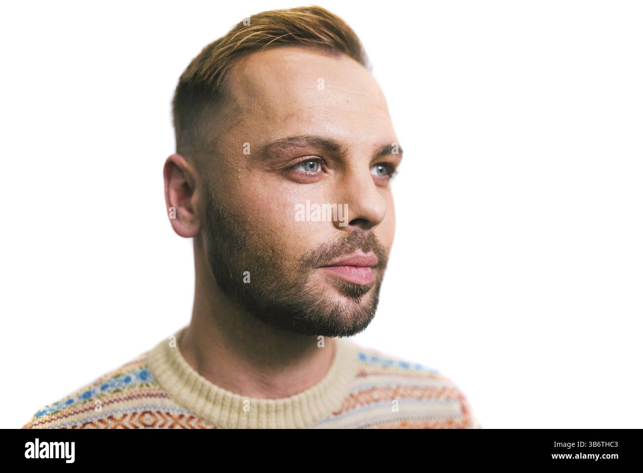 Portrait d'un jeune homme élégant et élégant de race blanche avec une barbe. L'homme homosexuel, gay-model posing Banque D'Images